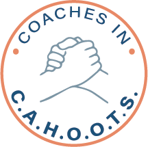 The logo for "Coaches in C.A.H.O.O.T.S." features two hands clasped in a firm handshake, depicted in a simple line drawing. The handshake is surrounded by the text "COACHES IN" at the top and "C.A.H.O.O.T.S." at the bottom. The text is in a circular layout, and the entire design is enclosed within a thin, circular border. The color scheme primarily uses shades of blue for the text and handshake drawing, with an orange outline around the border.